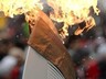 Одежда факелоносца вспыхнула во время эстафеты олимпийского огня в Хакасии