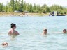 Саяногорцы спасаются от жары на карьере